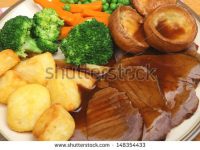 stock-photo-traditional-roast-beef-sunday-dinner-148354433